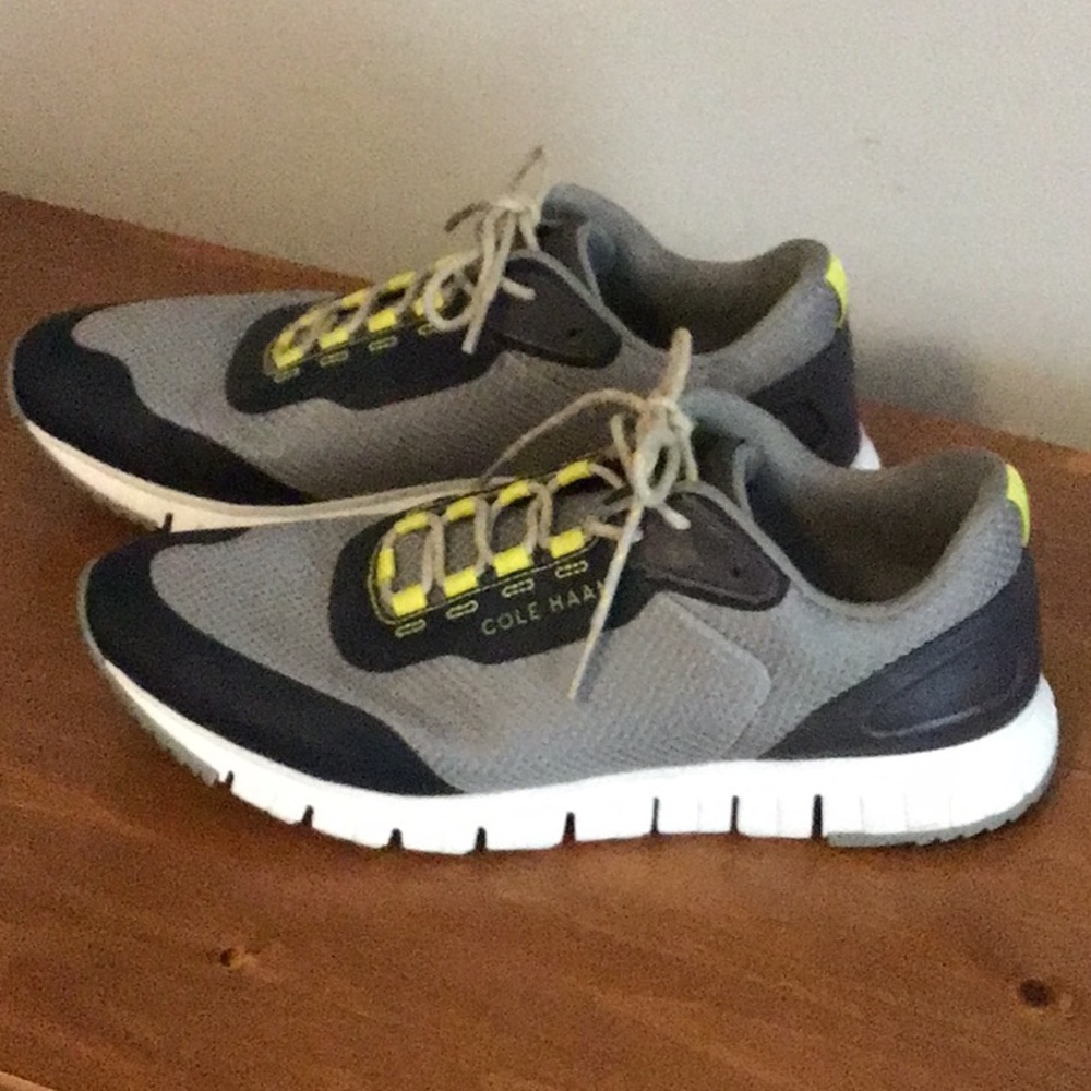 Like new Cole Haan tennis shoe, mens size 9.5, grey, black and neon yellow